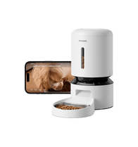 Petlibro white automatic smart pet feeder with camera and stainless steel bowl, shown with mobile app monitoring a dog eating