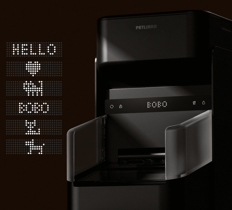 Petlibro black automatic pet feeder with digital LED display and open feeding tray showing pet name "BOBO"